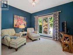 Main floor bedroom. Currently used as a den - 