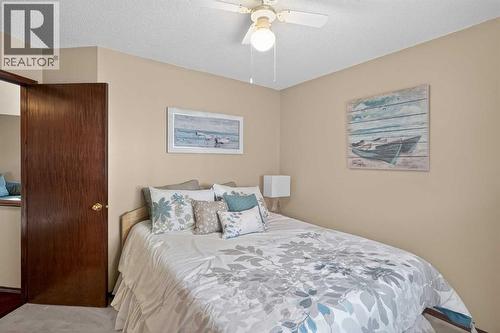 Bedroom #2 - 150 Somerset Close Sw, Calgary, AB - Indoor Photo Showing Bedroom