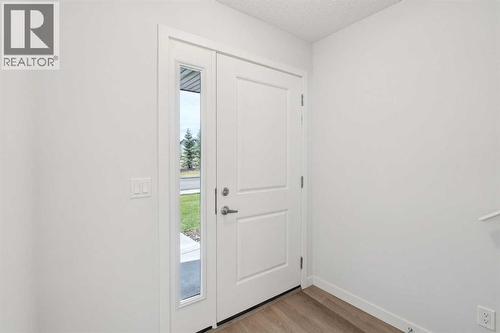 54 Evanscrest Manor Nw, Calgary, AB - Indoor Photo Showing Other Room