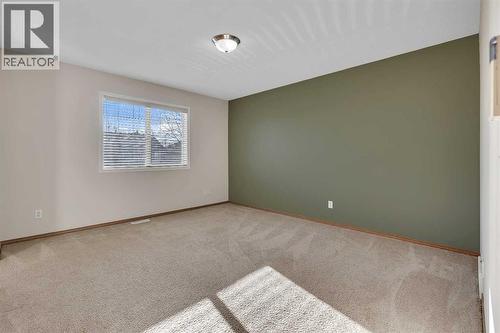 Primary Bedroom - 183 Covepark Way Ne, Calgary, AB - Indoor Photo Showing Other Room