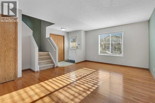 Hardwood Floors - 183 Covepark Way Ne, Calgary, AB - Indoor Photo Showing Other Room