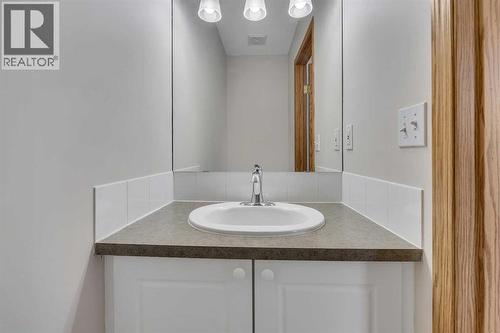 Main Floor - 183 Covepark Way Ne, Calgary, AB - Indoor Photo Showing Bathroom