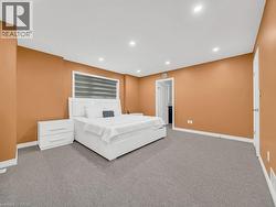 Bedroom featuring recessed lighting and carpet flooring - 