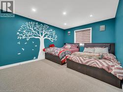 Carpeted bedroom featuring recessed lighting and baseboards - 