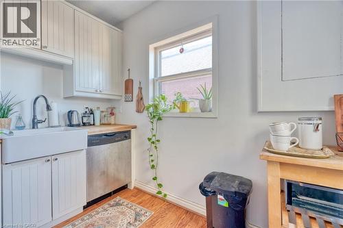 Both units' kitchens feature dishwashers. - 388 Charlton Avenue W, Hamilton, ON - Indoor