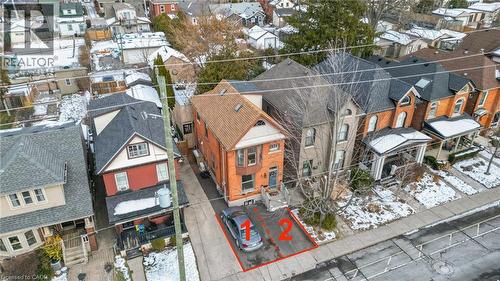 Private double-wide driveway, with new asphalt, and free parking on the street. - 388 Charlton Avenue W, Hamilton, ON - Outdoor