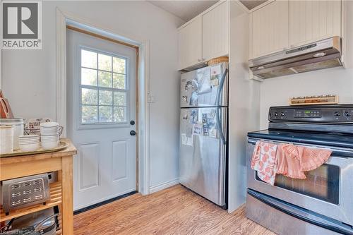 Unit #2's kitchen features stainless steel appliances. - 388 Charlton Avenue W, Hamilton, ON - Indoor