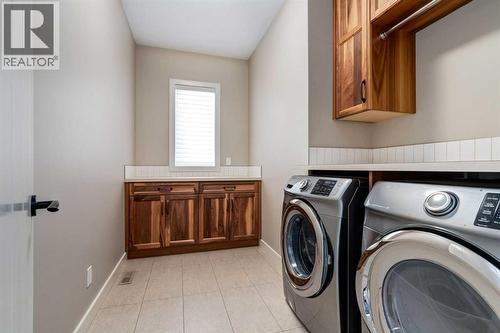 687 Cranston Avenue Se, Calgary, AB - Indoor Photo Showing Laundry Room