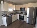 1 302 Herold Road, Saskatoon, SK  - Indoor Photo Showing Kitchen With Double Sink 