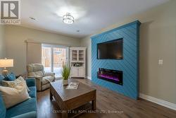 Custom built-in accent wall w/ electric fireplace - 