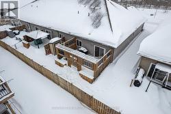 Custom privacy fencing around back deck - 