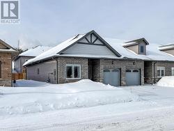 Attached single car garage, end unit - 