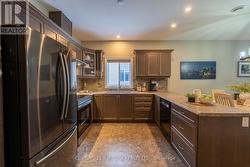 Upgraded kitchen cabinets with crown moulding - 