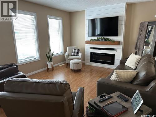 1483 Mather Crescent, Estevan, SK - Indoor Photo Showing Living Room With Fireplace