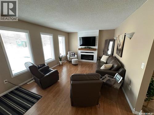1483 Mather Crescent, Estevan, SK - Indoor Photo Showing Living Room With Fireplace