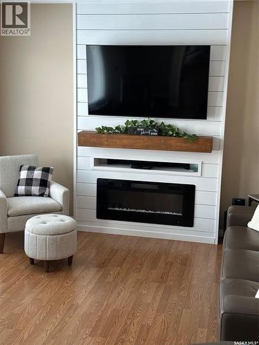 1483 Mather Crescent, Estevan, SK - Indoor Photo Showing Living Room With Fireplace
