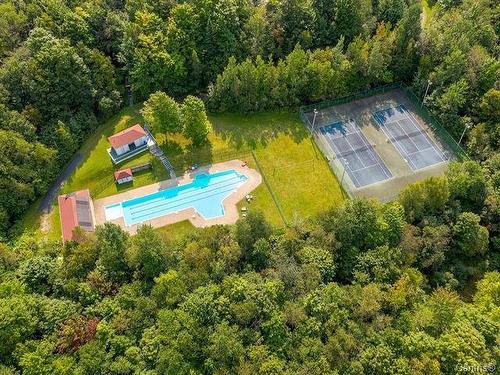Aerial photo - 302-556 Ch. Réal, Sutton, QC - Outdoor With In Ground Pool