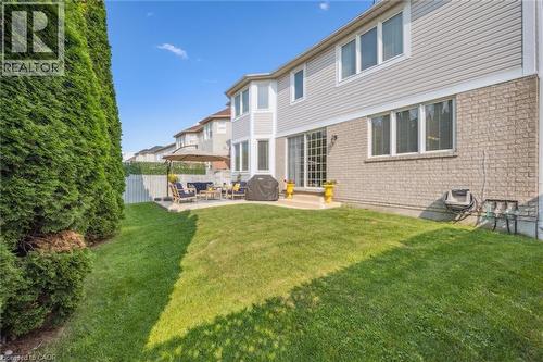 Summer photo: Fenced private backyard with a patio - 79 Zieman Crescent, Cambridge, ON - Outdoor With Deck Patio Veranda