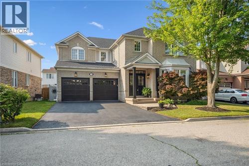 Summer photo: Exterior - 2-storey detached home with 2 car garage and 4 on driveway for a total of 6 parking spots - 79 Zieman Crescent, Cambridge, ON - Outdoor With Facade