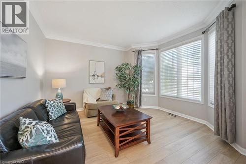 Living Room with large windows off of Entry - 79 Zieman Crescent, Cambridge, ON - Indoor Photo Showing Living Room