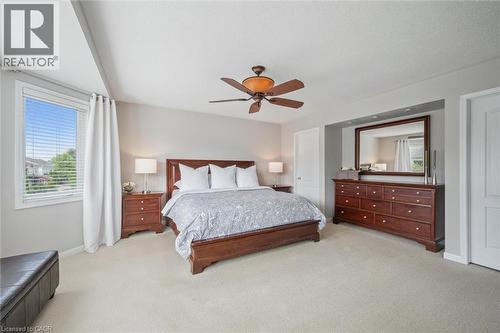 Primary Bedroom Suite with his and hers closets, electric fireplace, sitting area and 5-piece bathroom - 79 Zieman Crescent, Cambridge, ON - Indoor Photo Showing Bedroom