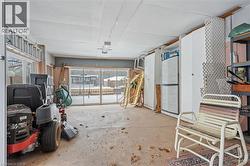 Misc room featuring concrete floors and a garage - 