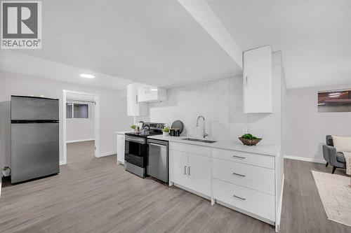 5868 Dalcastle Drive Nw, Calgary, AB - Indoor Photo Showing Kitchen