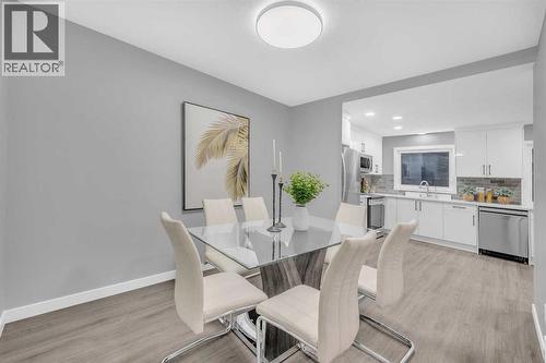 5868 Dalcastle Drive Nw, Calgary, AB - Indoor Photo Showing Dining Room