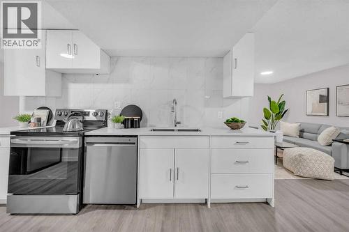 5868 Dalcastle Drive Nw, Calgary, AB - Indoor Photo Showing Kitchen