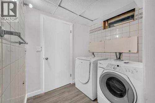 5868 Dalcastle Drive Nw, Calgary, AB - Indoor Photo Showing Laundry Room