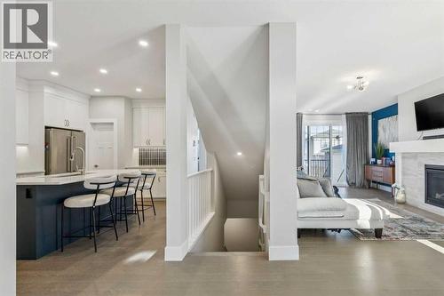 16 Treeline Lane Sw, Calgary, AB - Indoor Photo Showing Other Room With Fireplace