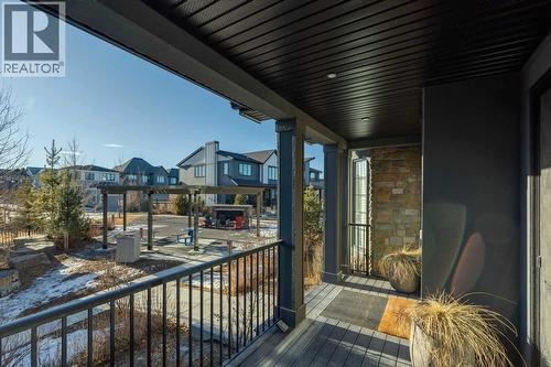 front porch overlooking park/greenspace - 16 Treeline Lane Sw, Calgary, AB - Outdoor With Exterior