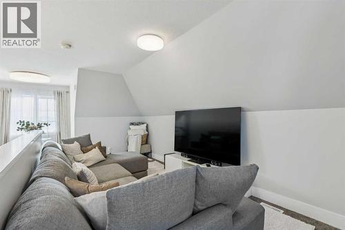 16 Treeline Lane Sw, Calgary, AB - Indoor Photo Showing Living Room