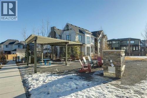 park/greenspace with fireplace - 16 Treeline Lane Sw, Calgary, AB - Outdoor