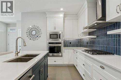16 Treeline Lane Sw, Calgary, AB - Indoor Photo Showing Kitchen With Double Sink With Upgraded Kitchen