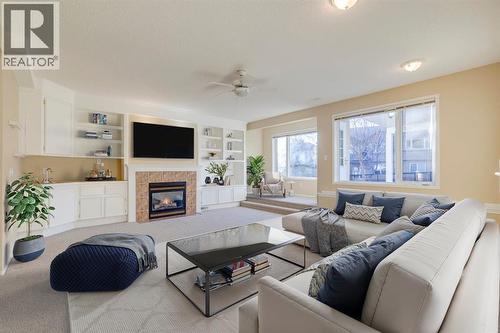 15875 Shannon Link Sw, Calgary, AB - Indoor Photo Showing Living Room With Fireplace