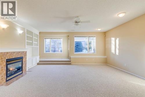 15875 Shannon Link Sw, Calgary, AB - Indoor With Fireplace