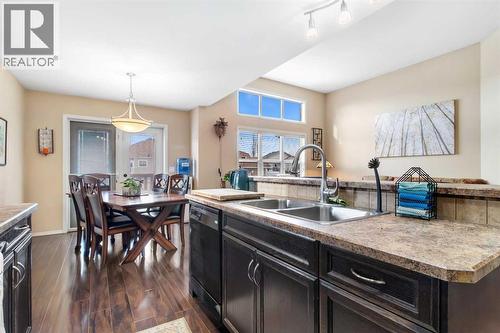 22 Morton Close, Penhold, AB - Indoor Photo Showing Kitchen With Double Sink