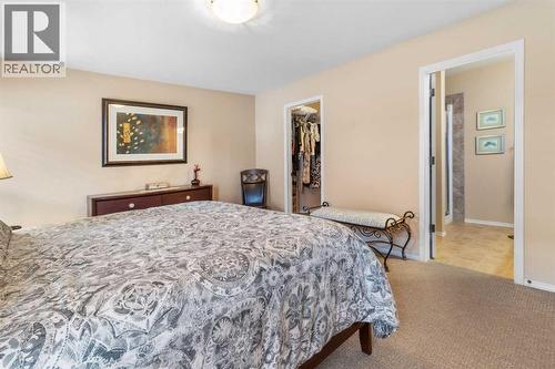 22 Morton Close, Penhold, AB - Indoor Photo Showing Bedroom