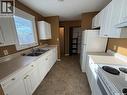970 Larson Crescent, Eston, SK  - Indoor Photo Showing Kitchen With Double Sink 