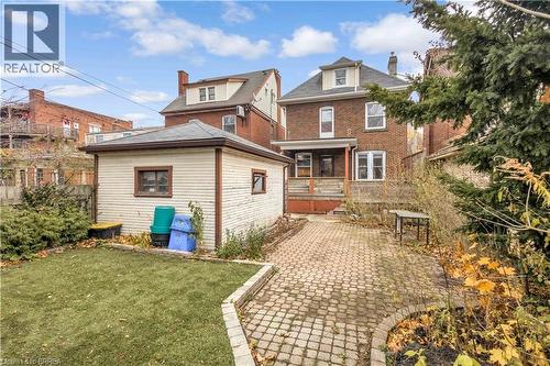 Rear view of house with brick siding - 134 Sherman Avenue S, Hamilton, ON - Outdoor