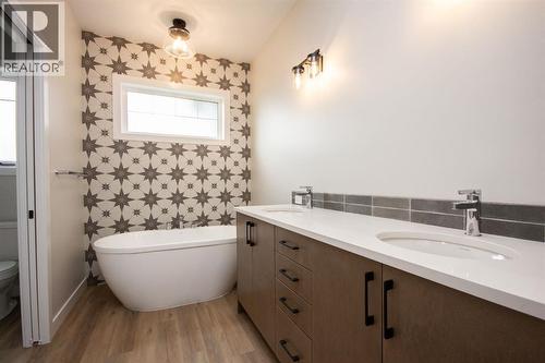 Photos and renderings are examples from a similar home built previously and do not necessarily reflect finished and colours used in this home - 37 Terra Close, Red Deer, AB - Indoor Photo Showing Bathroom
