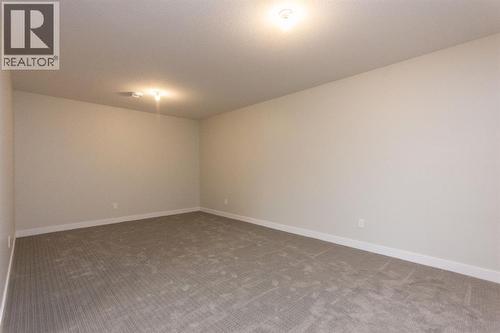 Photos and renderings are examples from a similar home built previously and do not necessarily reflect finished and colours used in this home - 37 Terra Close, Red Deer, AB - Indoor Photo Showing Other Room