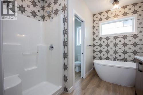 Photos and renderings are examples from a similar home built previously and do not necessarily reflect finished and colours used in this home - 37 Terra Close, Red Deer, AB - Indoor Photo Showing Bathroom