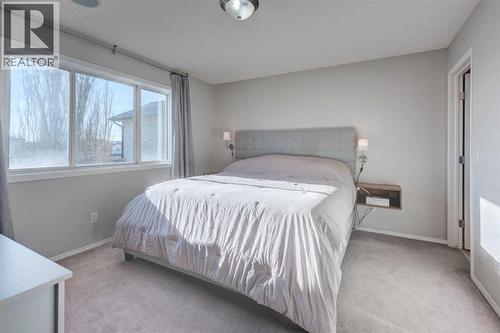 239 Chapalina Place Se, Calgary, AB - Indoor Photo Showing Bedroom
