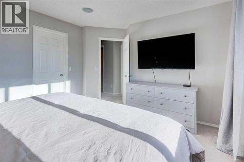 239 Chapalina Place Se, Calgary, AB - Indoor Photo Showing Bedroom