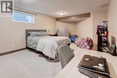 239 Chapalina Place Se, Calgary, AB - Indoor Photo Showing Bedroom