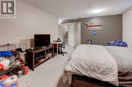 239 Chapalina Place Se, Calgary, AB - Indoor Photo Showing Bedroom