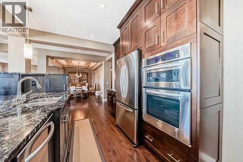 49 Crestridge View Sw, Calgary, AB - Indoor Photo Showing Kitchen With Double Sink With Upgraded Kitchen