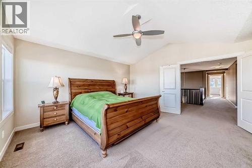 49 Crestridge View Sw, Calgary, AB - Indoor Photo Showing Bedroom